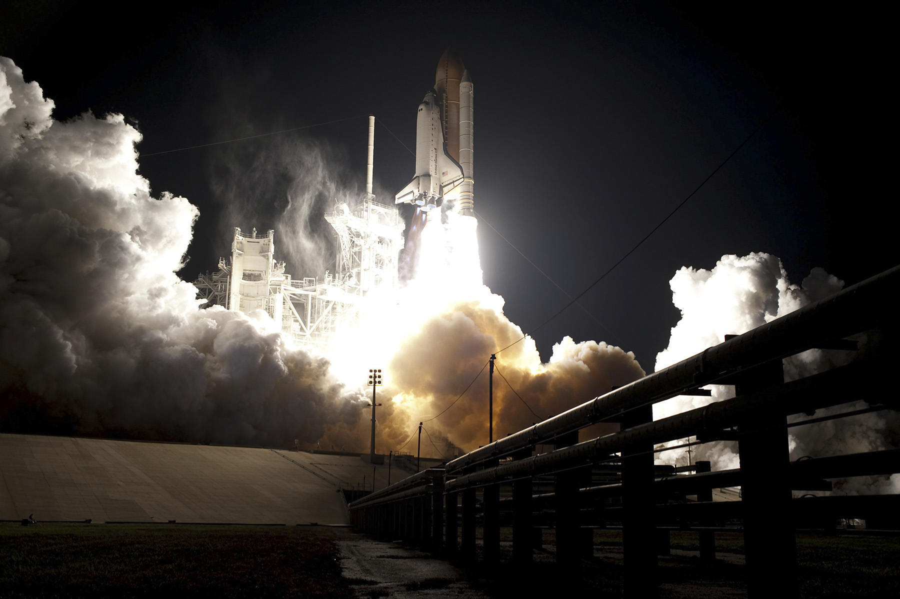 The photo shows Endeavour blasting off at night from the Kennedy Space Center in Florida.