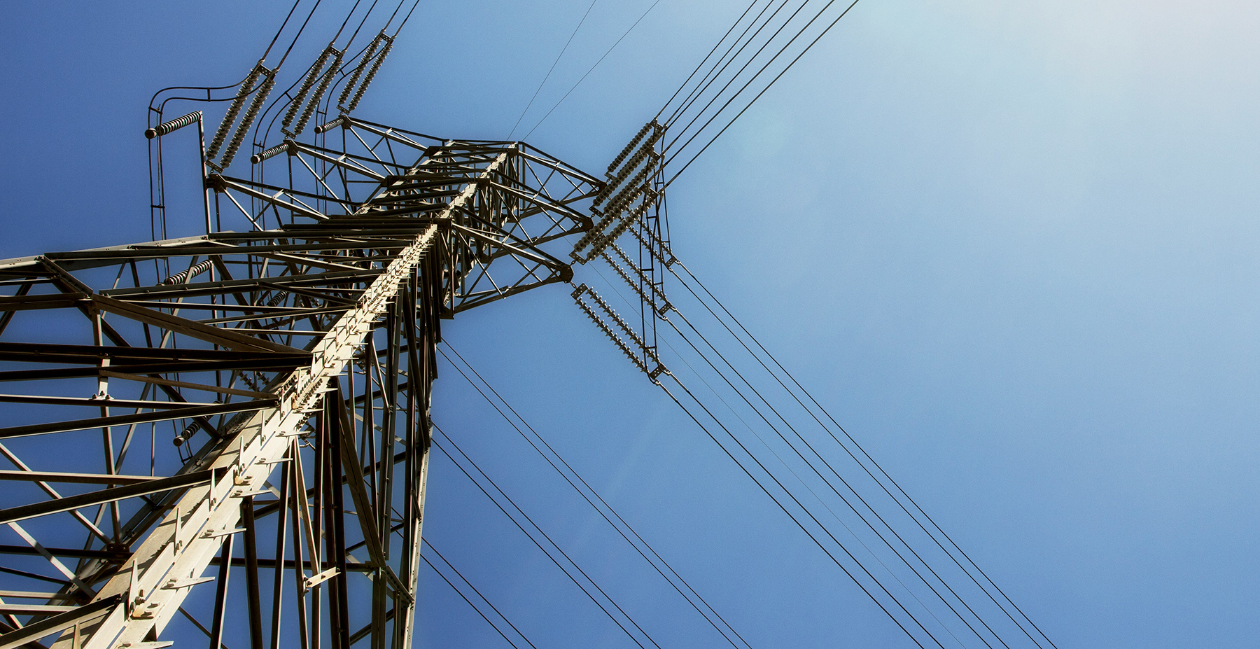 upward looking image of a power pole