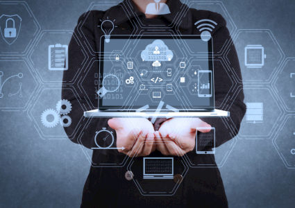 On-Demand Seminars: Person holding a laptop with different icons floating around it.